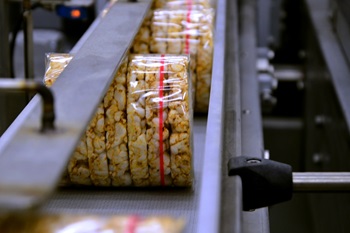 Closeup of Packaged Food On Conveyor